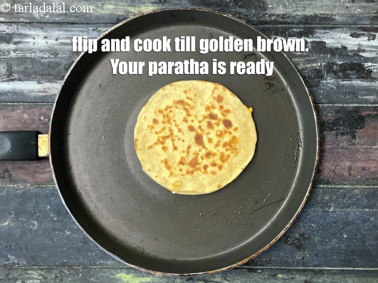 Step 37 – <meta charset="UTF-8" /> Flip and cook till golden brown.&nbsp;Your <strong>corn capsicum cheese paratha |&nbsp;stuffed corn …