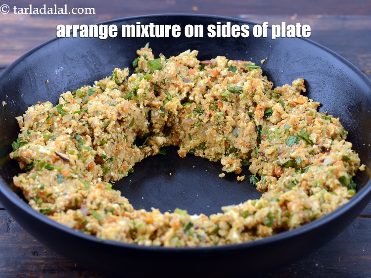 Step 29 – Arrange the mixture on the sides of the plate.