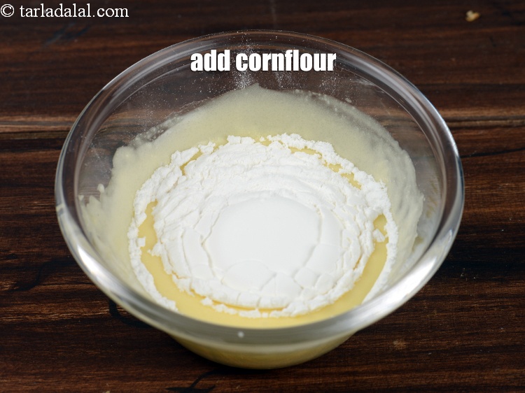 Step 31 – Add 2 tbsp <a href="https://www.tarladalal.com/glossary-cornflour-cornstarch-maize-starch-corn-flour-112i">cornflour</a>.