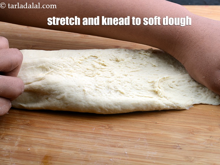 Step 36 – Stretch and knead a soft dough.