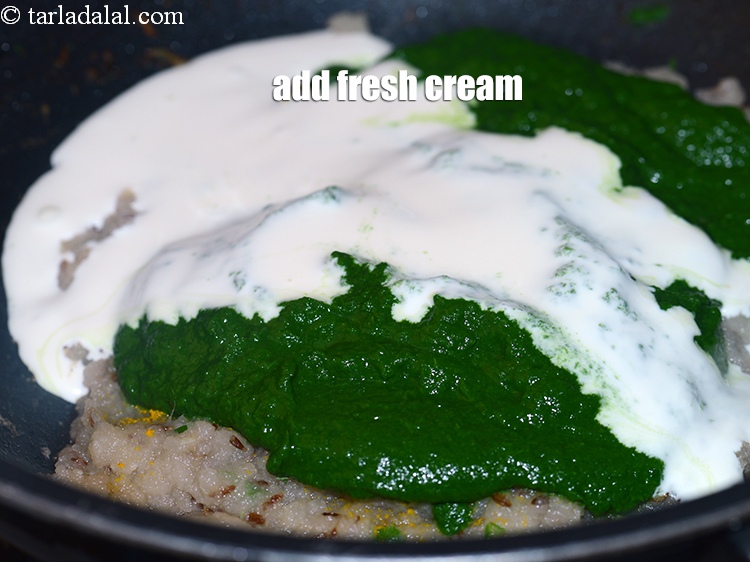 Step 29 – Add &frac14; cup <a href="https://www.tarladalal.com/glossary-fresh-cream-1877i">fresh cream</a>.&nbsp;