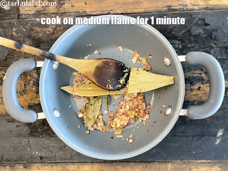 Step 47 – Cook on a medium flame for 1 minute.