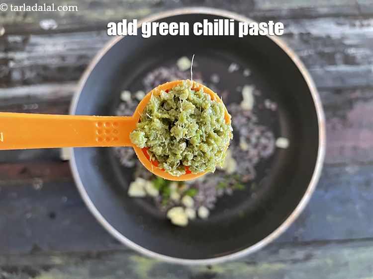 Step 40 – Add&nbsp;<meta charset="UTF-8" />1 tsp&nbsp;<a href="glossary-green-chilli-paste-hari-mirch-ki-paste-mirchi-paste-333i">green chilli paste</a>.
