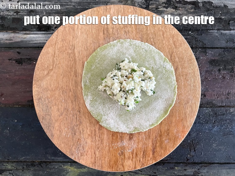Step 31 – Put one portion of the stuffing in the centre.