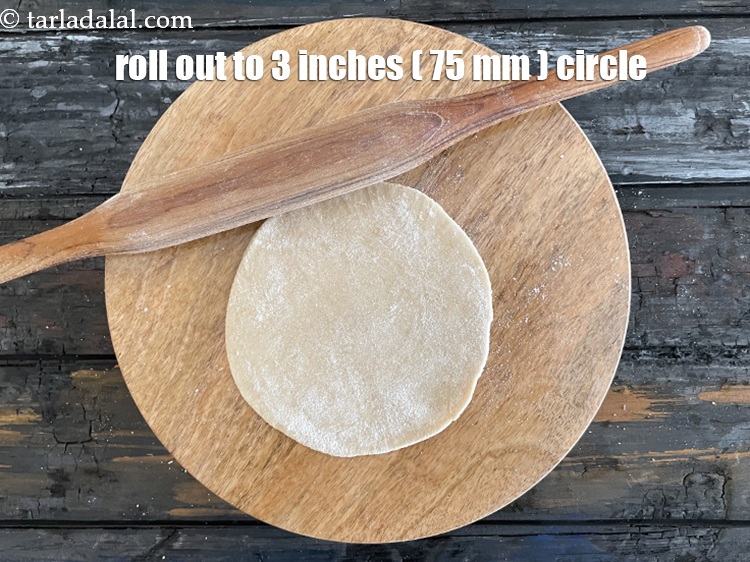 Step 30 – Roll out each portion of the dough into a 75 mm. (3&quot;) diameter circle.