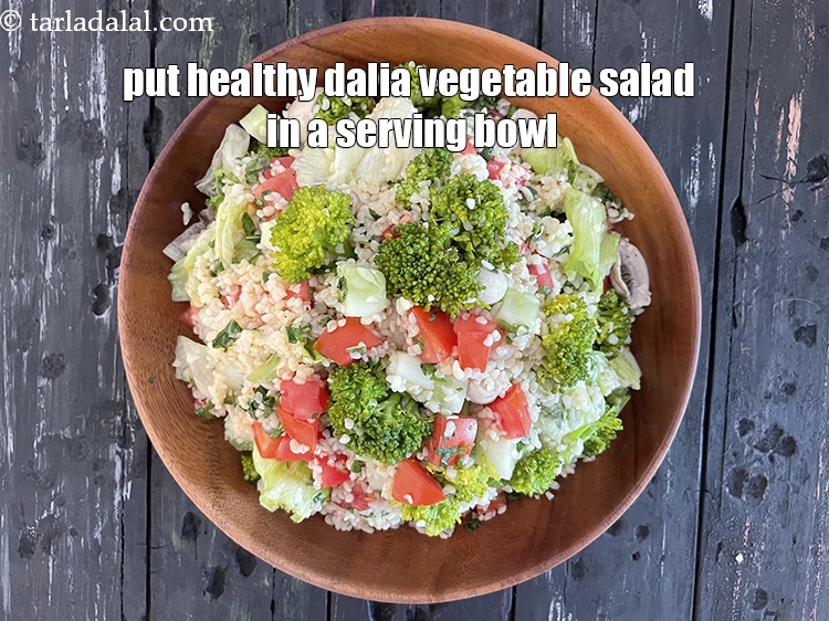 Step 30 – <meta charset="UTF-8" /> Transfer <meta charset="UTF-8" /><strong>Indian broken wheat vegetable salad&nbsp;</strong>&nbsp;to a serving bowl.&nbsp;