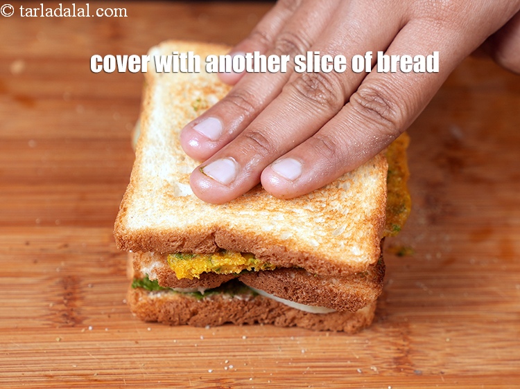 Step 31 – Cover it with another slice of bread with the buttered-chutney side facing downwards and press …