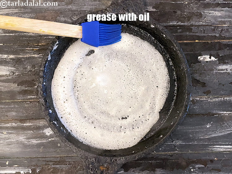 Step 36 – Grease the sides of the pan with oil.
