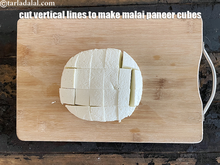 Step 39 – Then cut vertical lines to make cubes of malai paneer.