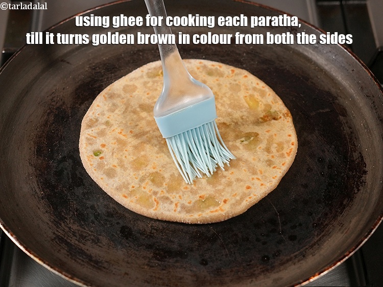 Step 29 – Using 1/2 tsp ghee for cooking each paratha,&nbsp;till it turns golden brown in colour from …