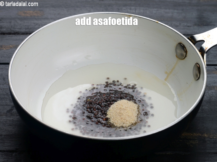Step 30 – Add &frac14; tsp asafoetida.&nbsp;