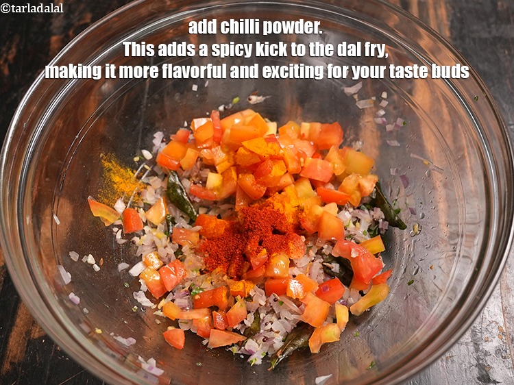 Step 30 – Add &frac12; tsp <a href="https://www.tarladalal.com/glossary-chilli-powder-red-chilli-powder-339i">chilli powder</a>. This adds a spicy kick to the dal fry, …