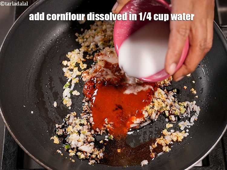 Step 29 – Add 1 tbsp&nbsp;<a href="https://www.tarladalal.com/glossary-cornflour-cornstarch-maize-starch-corn-flour-112i">cornflour</a>&nbsp;dissolved in 1/4 cup&nbsp;<a href="https://www.tarladalal.com/glossary-water-pani-647i">water</a>.