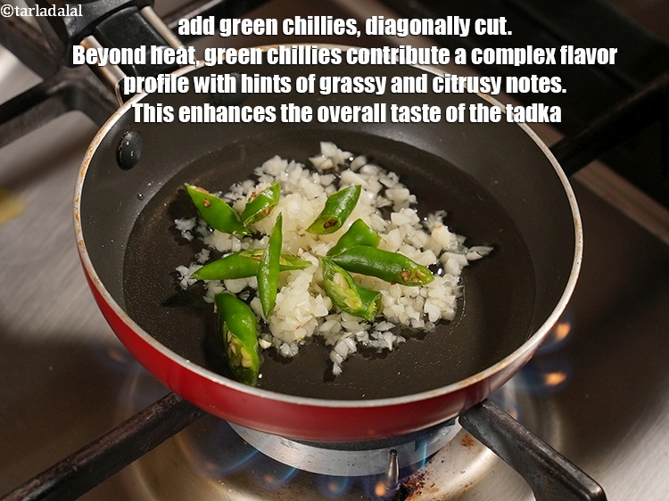 Step 30 – Add 2&nbsp;<a href="https://www.tarladalal.com/glossary-green-chillies-hari-mirch-331i">green chillies</a>, diagonally cut. Beyond heat, green chillies contribute a complex flavor profile …