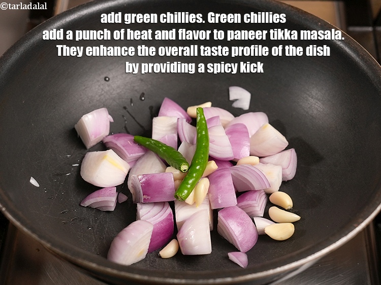 Step 31 – Add 2 green chillies.&nbsp;Green chillies add a punch of heat and flavor to paneer tikka …