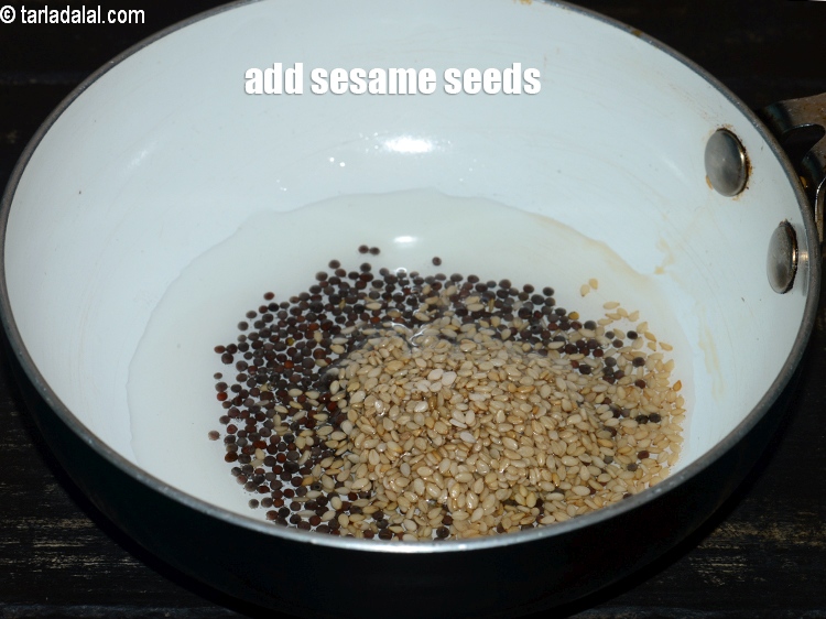 Step 31 – Add 1 tsp <a href="https://www.tarladalal.com/glossary-sesame-seeds-til-gingelly-seeds-612i">sesame seeds (til)</a>.&nbsp;
