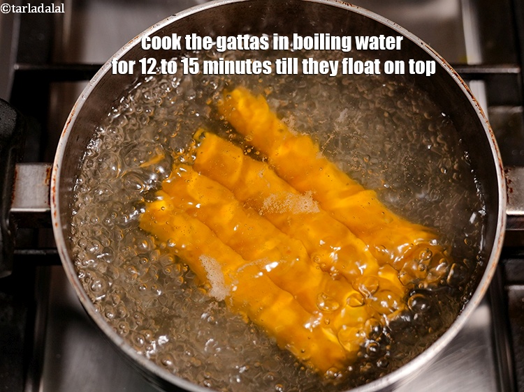 Step 30 – Cook the gattas in boiling water for 12 to 15 minutes till they float on …