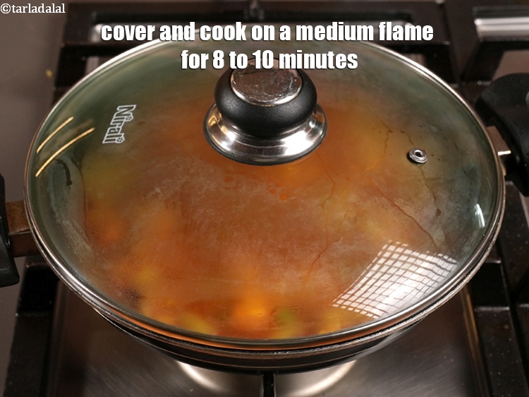 Step 30 – Cover and cook on a medium flame for 8 to 10 minutes, while stirring occasionally.
