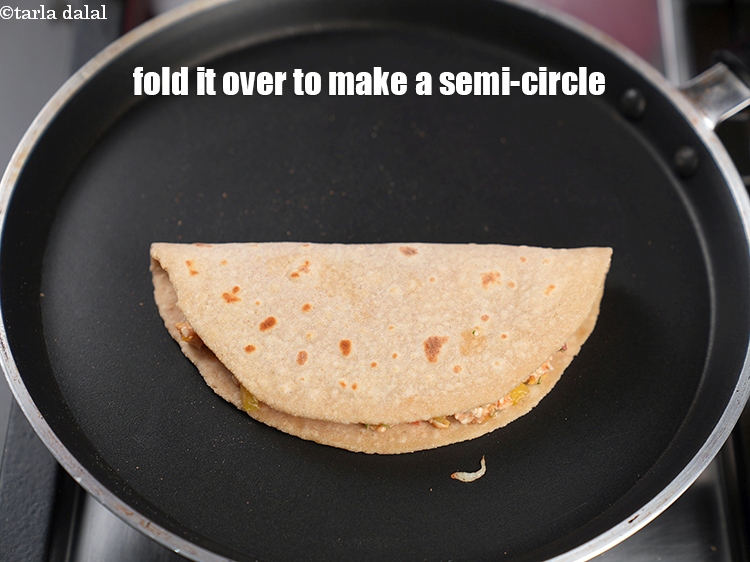 Step 32 – Fold it over to make a semi-circle.