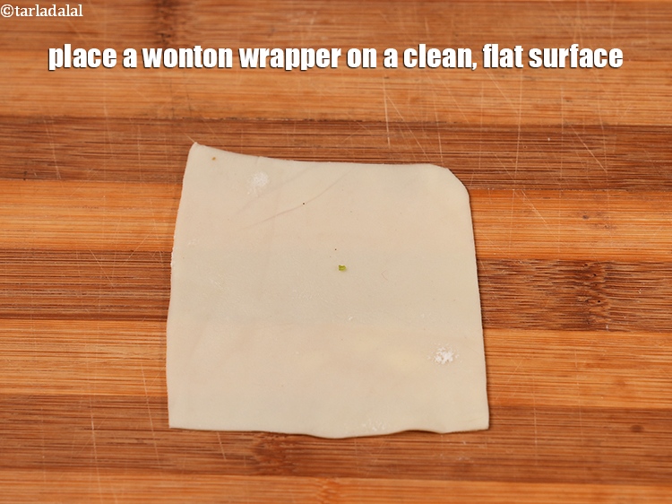 स्टेप 30 – वॉन्टन रैपर को साफ, समतल सतह पर रखें।