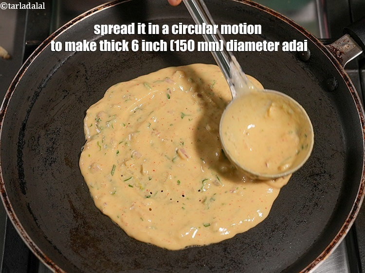 Step 30 – Spread it in a circular motion to make thick 6 inch (150 mm) diameter adai.