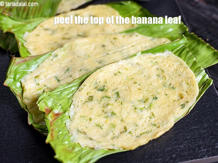 Step 38 – Peel the top of the banana leaf. Your moong dal panki is ready.