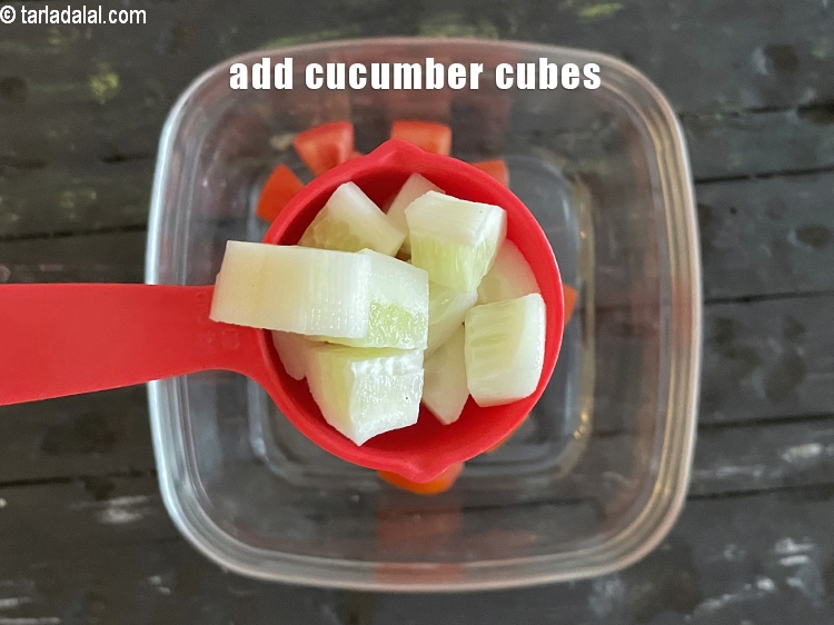 Step 30 – Add&nbsp;<meta charset="UTF-8" />1/4 cup&nbsp;<a href="glossary-cucumber-cubes-726i">cucumber cubes</a>.