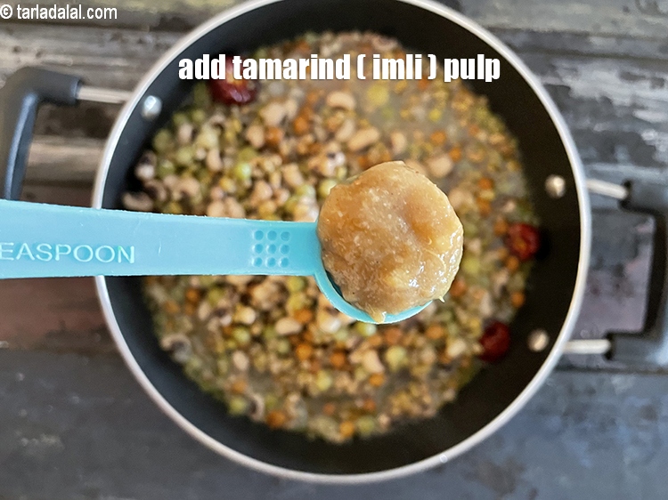 Step 30 – Add&nbsp;<meta charset="UTF-8" />1/2 tsp&nbsp;<a href="glossary-tamarind-pulp-tamarind-extract-imli-ka-pulp-838i">tamarind (imli) pulp</a>.