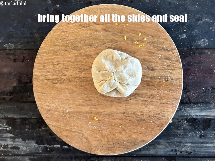 Step 40 – Bring together all the sides in the center and seal tightly.