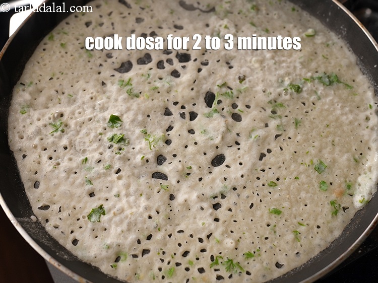 Step 31 – Cook the dosa on medium flame for 2 to 3 minutes until it becomes brown …