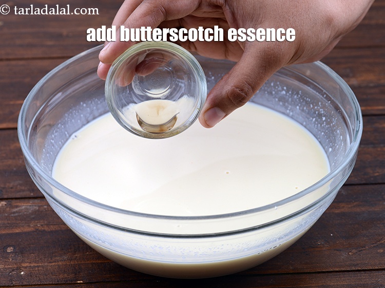 Step 30 – Add &frac12; tsp <a href="https://www.tarladalal.com/glossary-butterscotch-essence-968i">butterscotch essence</a>.&nbsp;