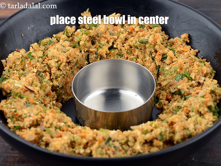 Step 30 – Place a steel bowl in center of the mixture.