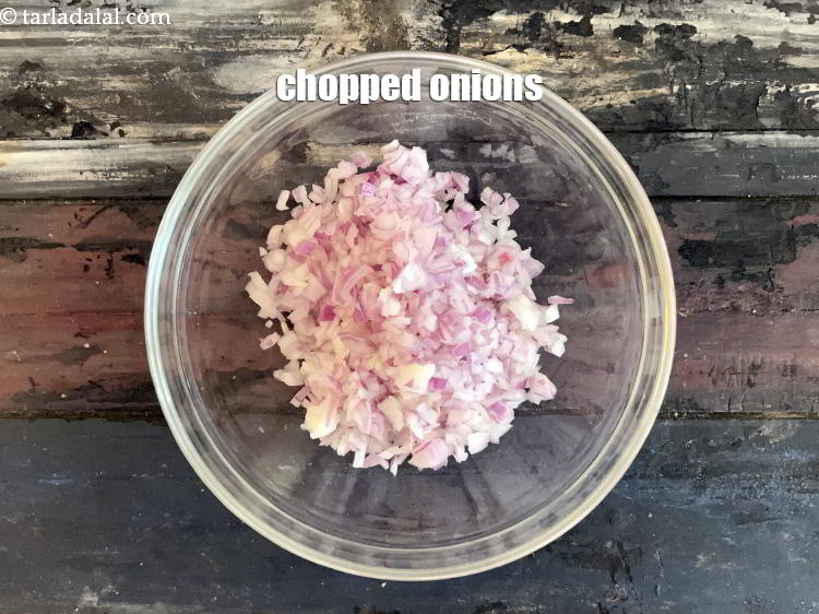 Step 33 – In a bowl put&nbsp;<meta charset="UTF-8" />1 cup&nbsp;finely&nbsp;<a href="glossary-chopped-onions-722i">chopped onions</a>.