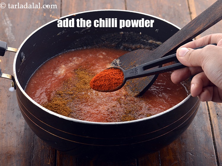 Step 28 – Add the chilli powder for spice.