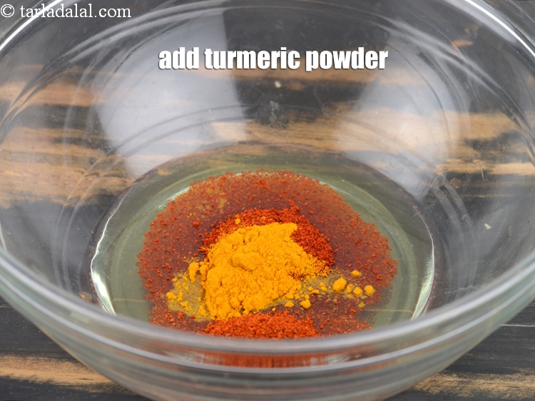 Step 32 – Add 1/4 tsp&nbsp;<a href="https://www.tarladalal.com/glossary-turmeric-powder-haldi-645i">turmeric powder (haldi)</a>.