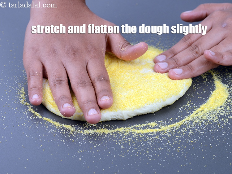 Step 30 – Stretch and flatten the dough slightly.