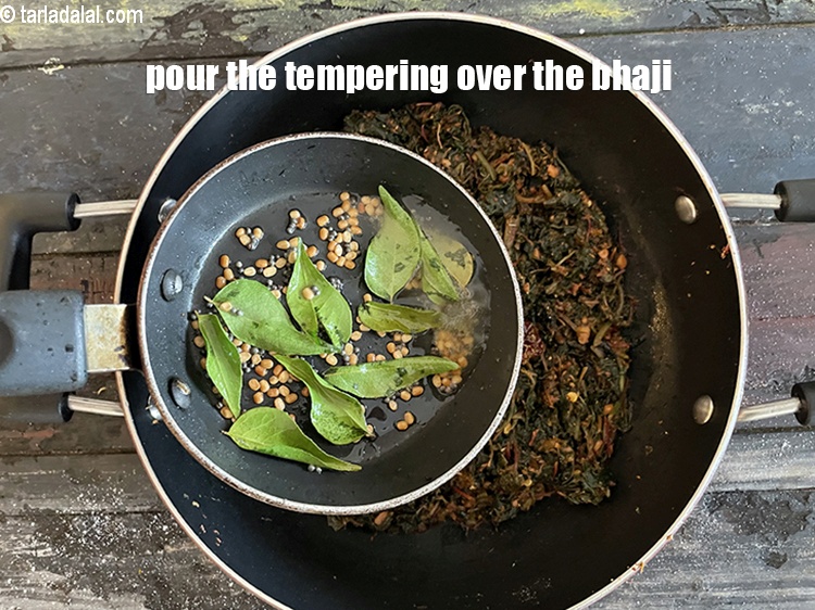 Step 36 – Pour this tempering over the bhaji.