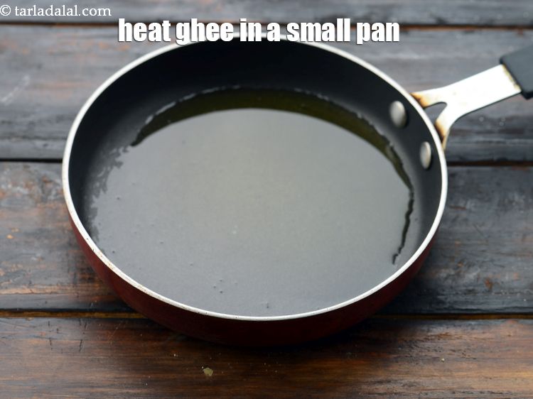 Step 35 – &nbsp;For the tempering, heat 2 tsp ghee in a small non-stick pan.