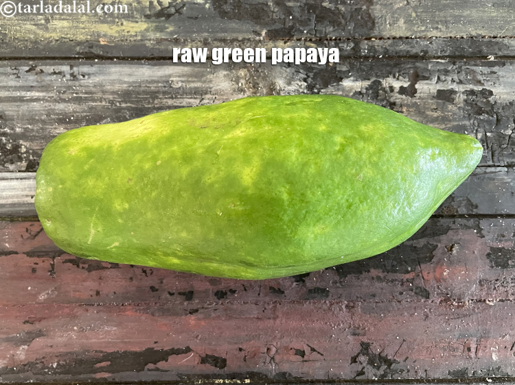 Step 3 – <meta charset="UTF-8" />This is what raw green papaya looks like.&nbsp;