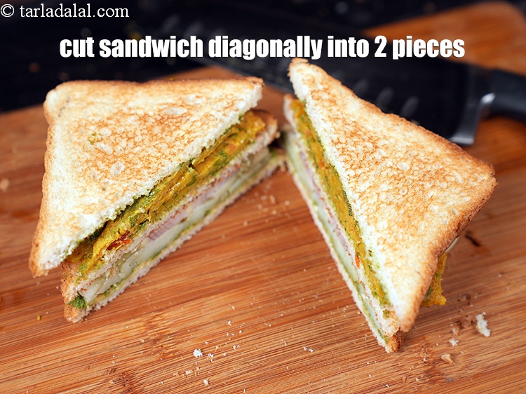Step 32 – Cut the sandwich diagonally into 2 pieces using a sharp knife.