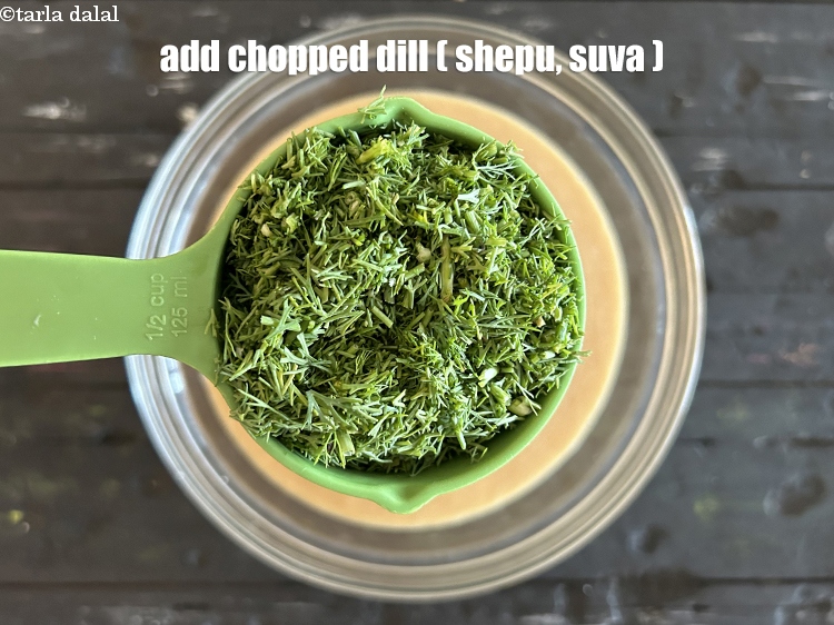 Step 31 – Add&nbsp;<meta charset="UTF-8" />1/2 cup&nbsp;finely&nbsp;<a href="glossary-chopped-dill-leaves-1849i">chopped dill (shepu / suva bhaji)</a>.