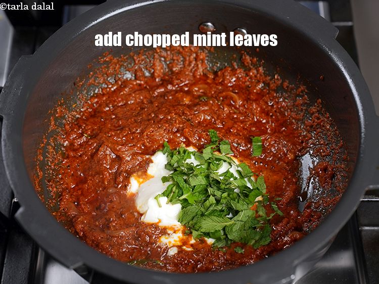 Step 31 – Add &frac14; cup <a href="https://www.tarladalal.com/glossary-chopped-mint-788i">chopped mint leaves (phudina)</a>.
