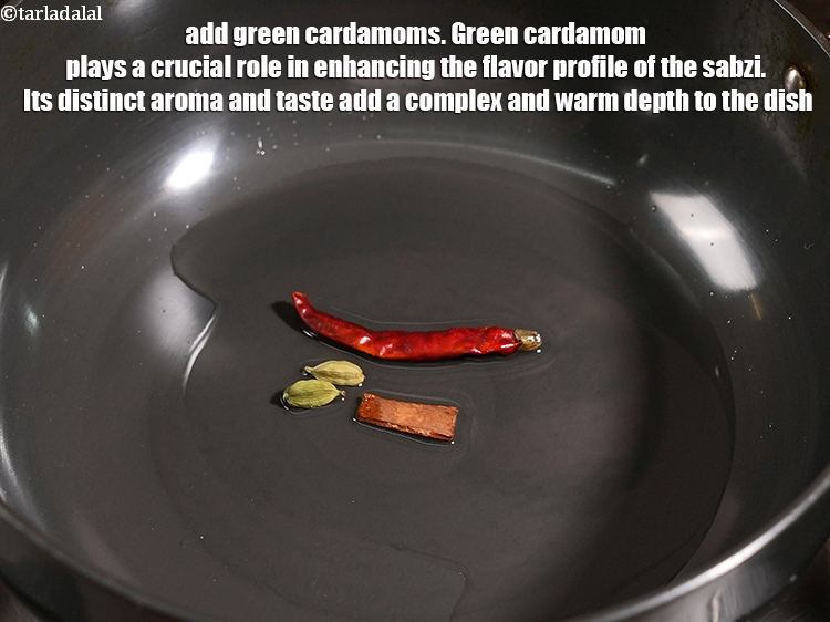 Step 31 – Add 2 green <a href="https://www.tarladalal.com/glossary-cardamom-elaichi-262i">cardamoms (elaichi)</a>. Green cardamom plays a crucial role in enhancing the …