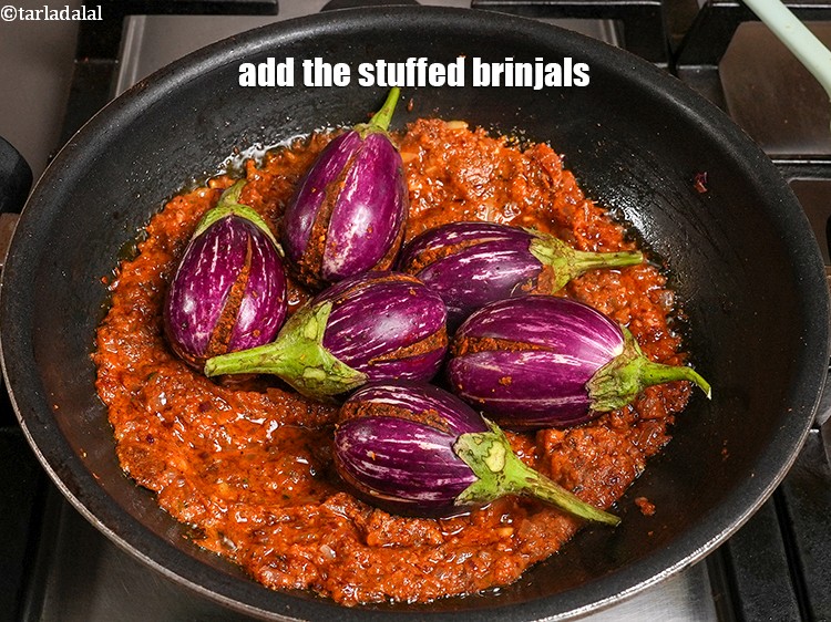 Step 31 – Add the stuffed brinjals.