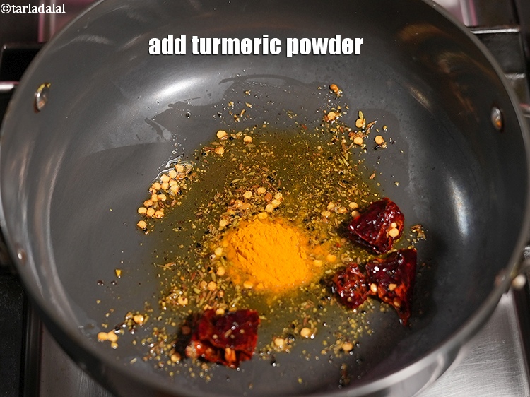 Step 31 – Add &frac12; tsp <a href="https://www.tarladalal.com/glossary-turmeric-powder-haldi-645i">turmeric powder (haldi)</a>.