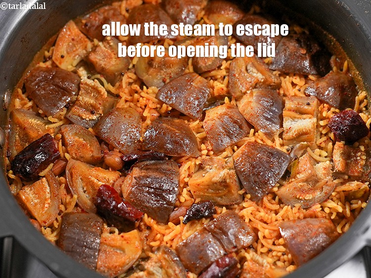 Step 31 – Allow the steam to escape before opening the lid.