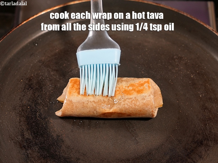 Step 33 – Cook each wrap on a hot tava from all the sides using 1/4 tsp oil.