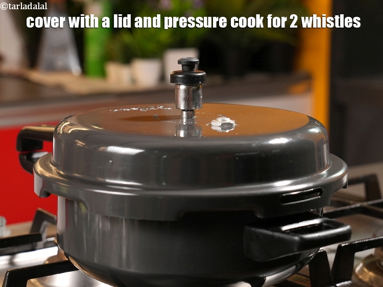Step 31 – Cover with a lid and pressure cook for 2 whistles.