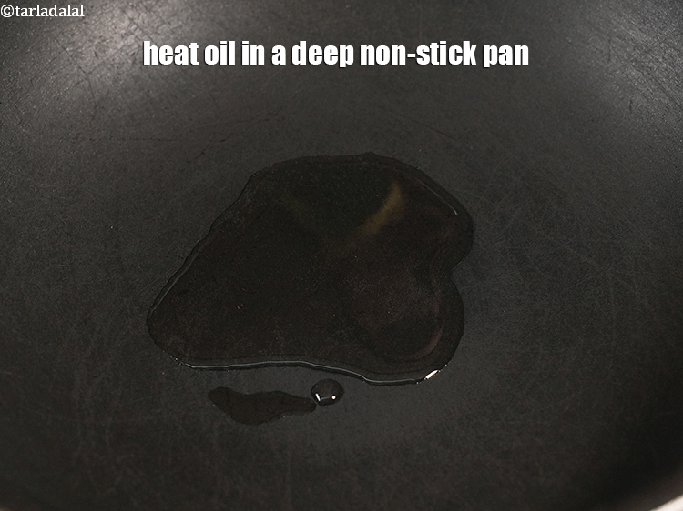 Step 31 – Heat 1 tbsp <a href="https://www.tarladalal.com/glossary-oil-671i">oil</a> in a deep non-stick pan.