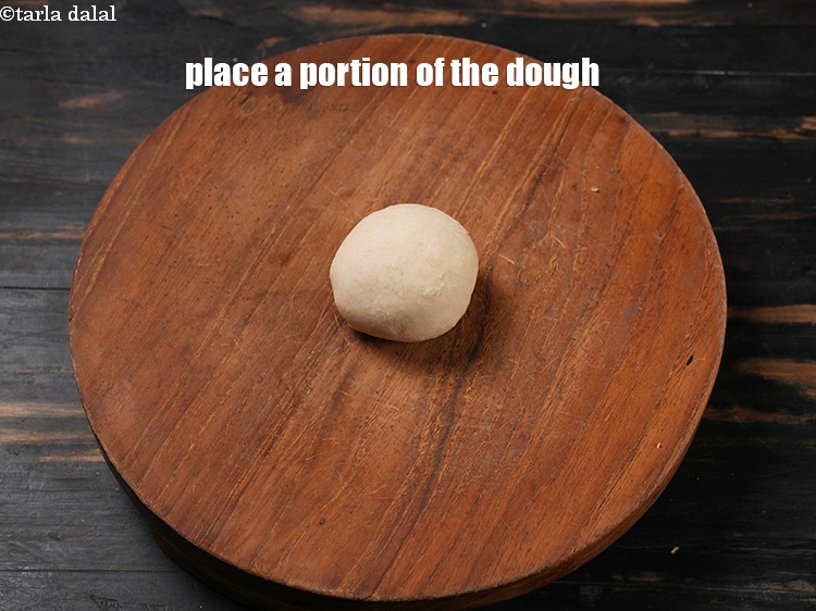 Step 31 – Place a portion of the dough.